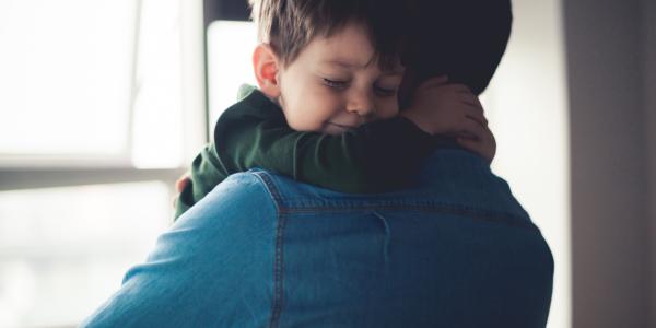 Child Hugging Father